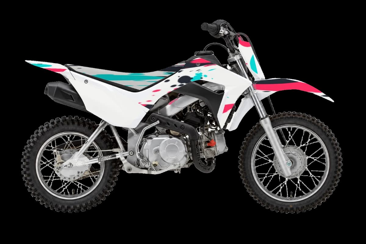 Paint splatter style dirt bike graphics kit on a Honda CRF110F