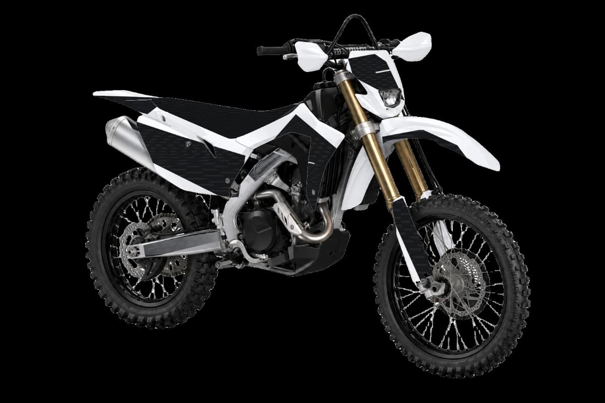 Carbon fiber style dirt bike graphics kit on a Honda CRF450X