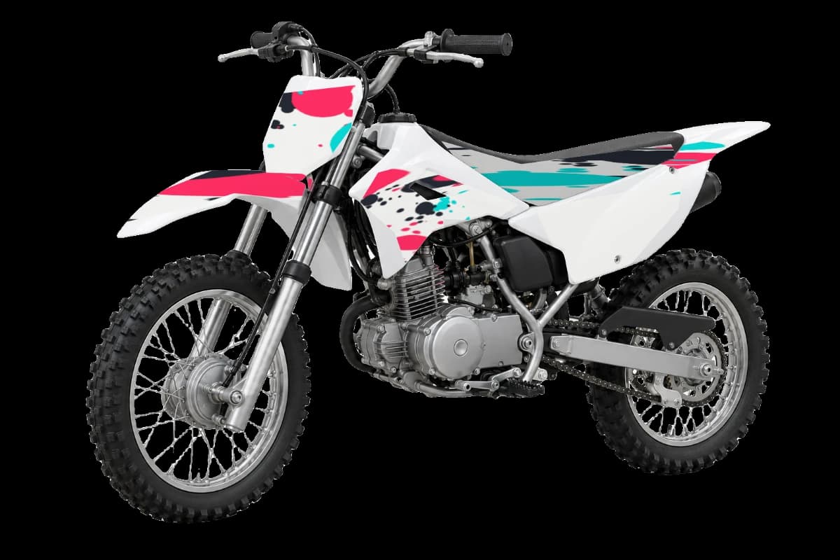 Paint splatter style dirt bike graphics kit on a Kawasaki KLX110R