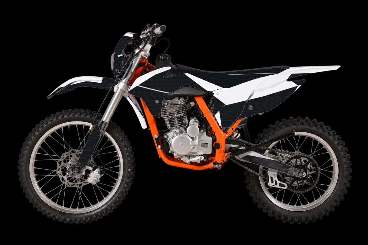Carbon fiber style dirt bike graphics kit on a Kayo K2