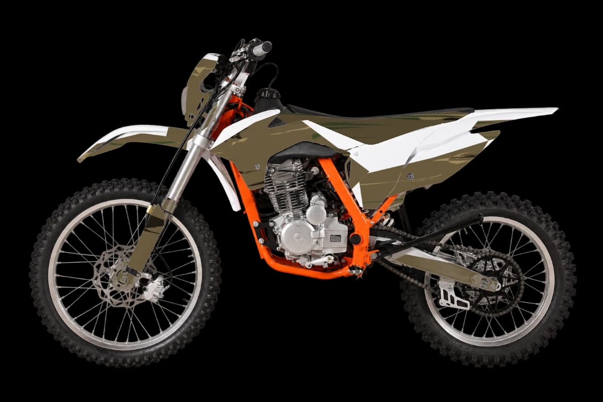 Woodland camo style dirt bike graphics kit on a Kayo K2