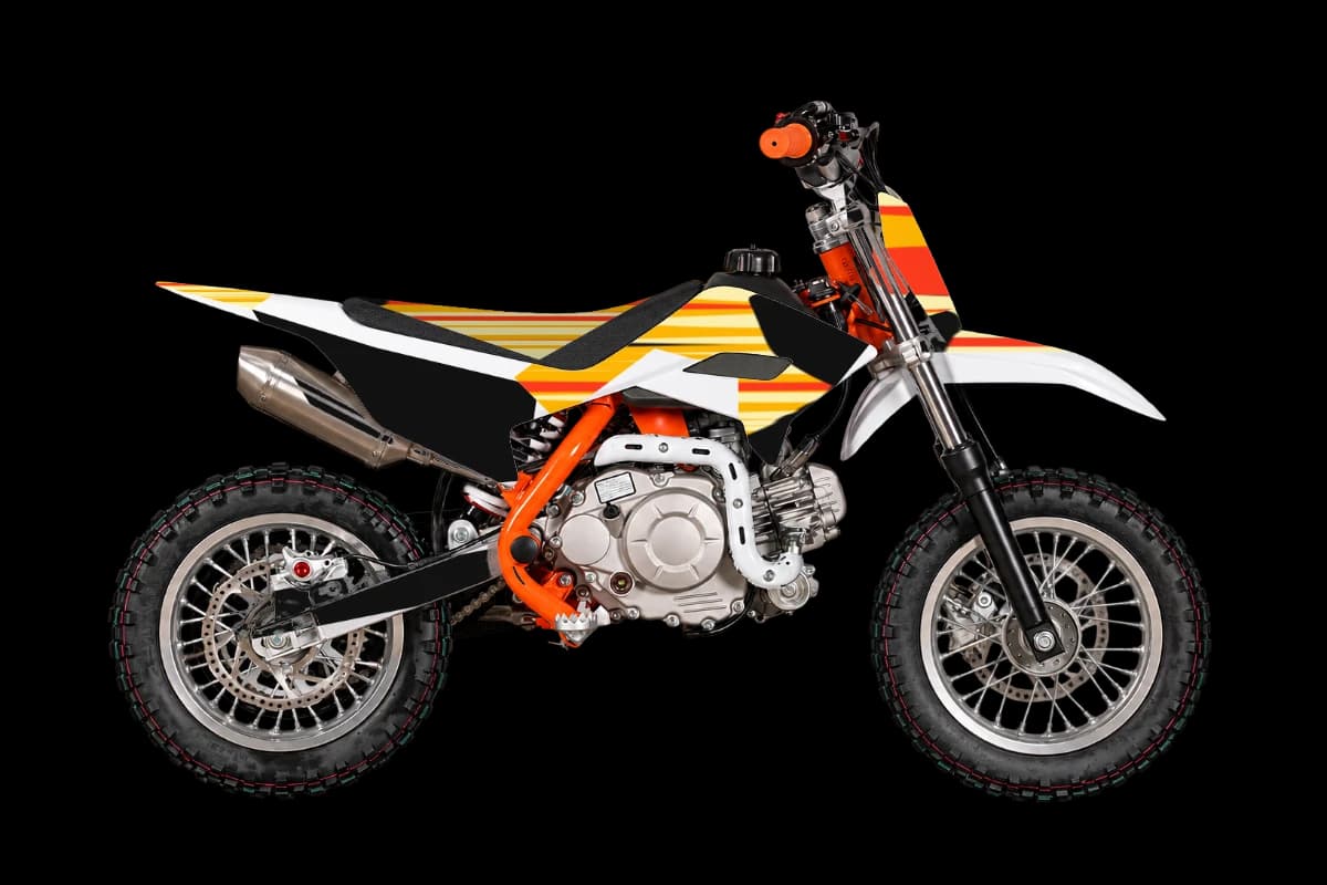 Flame style dirt bike graphics kit on a Kayo KMB