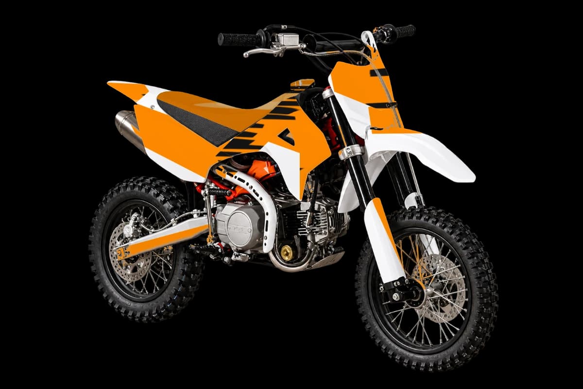 Tiger stripe style dirt bike graphics kit on a Kayo TD110