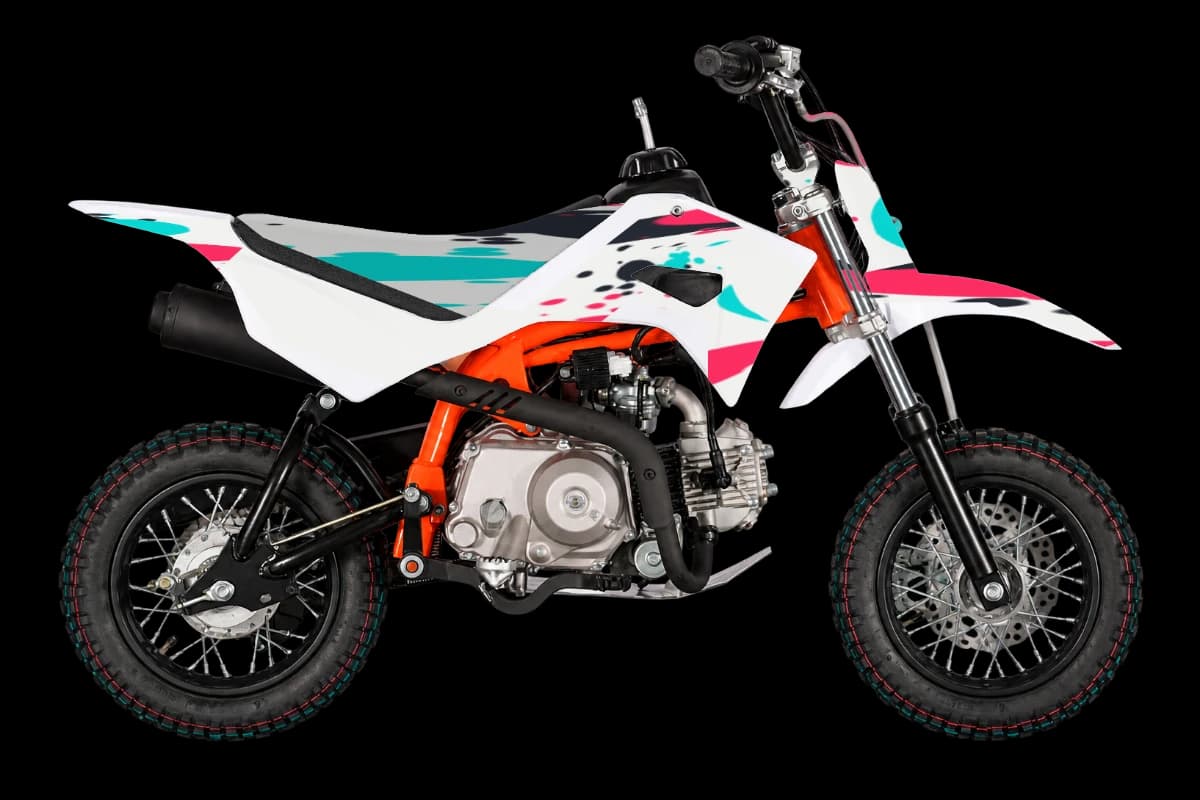 Paint splatter style dirt bike graphics kit on a Kayo TS70