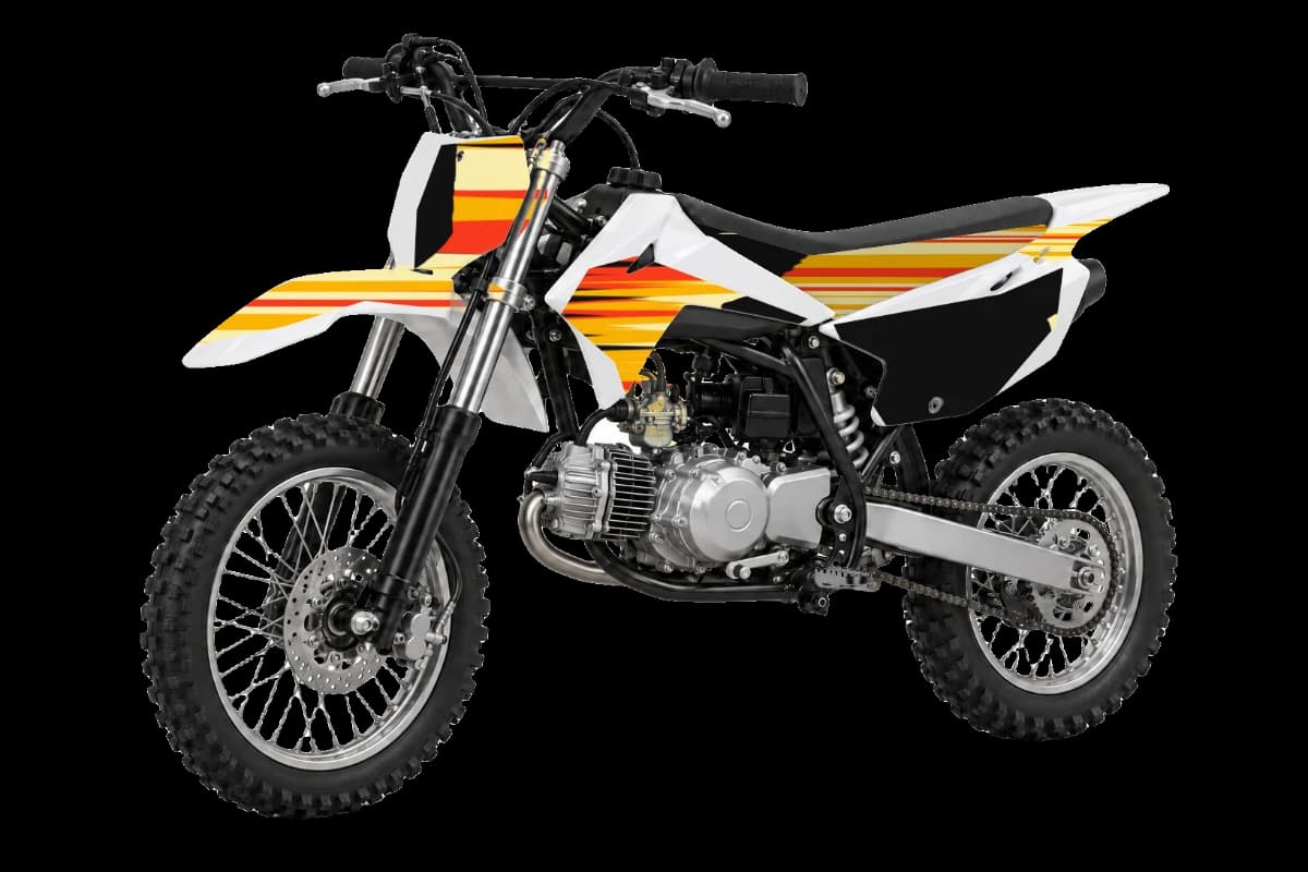 Flame style dirt bike graphics kit on a Kayo TS90
