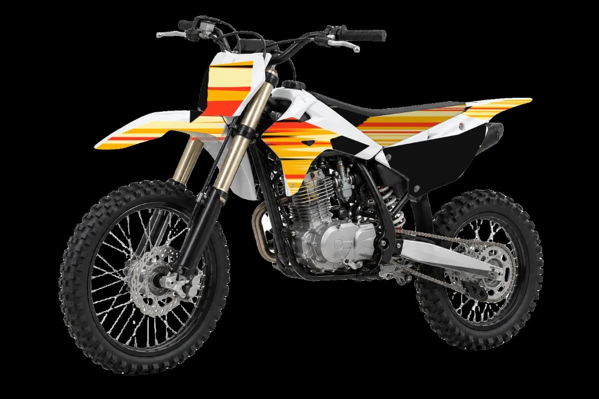 Flame style dirt bike graphics kit on a Kayo TT125