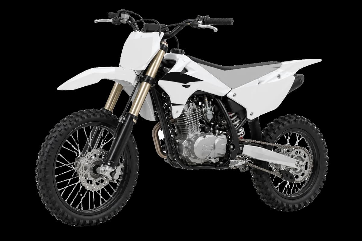 Tribal style dirt bike graphics kit on a Kayo TT125