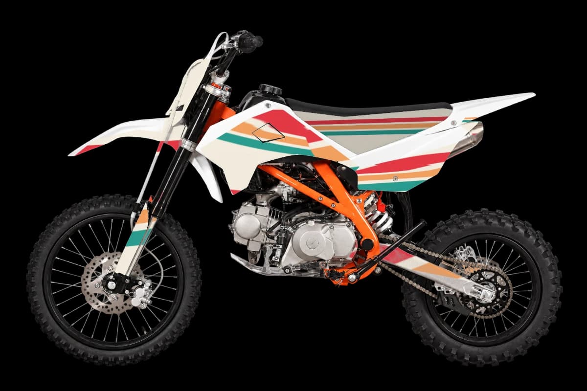 Retro style dirt bike graphics kit on a Kayo TT140