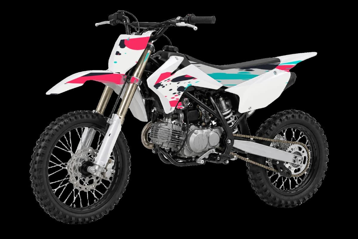 Paint splatter style dirt bike graphics kit on a Kayo TT140