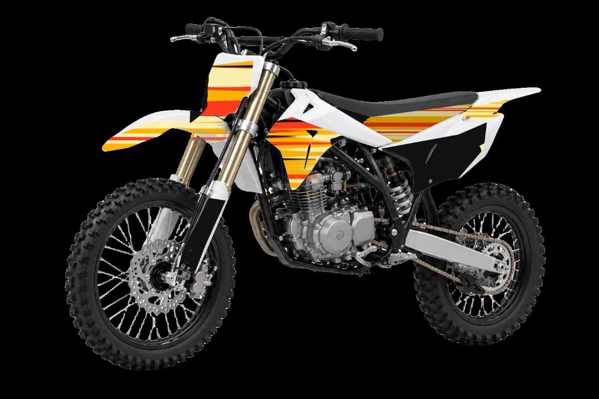 Flame style dirt bike graphics kit on a Kayo TT160