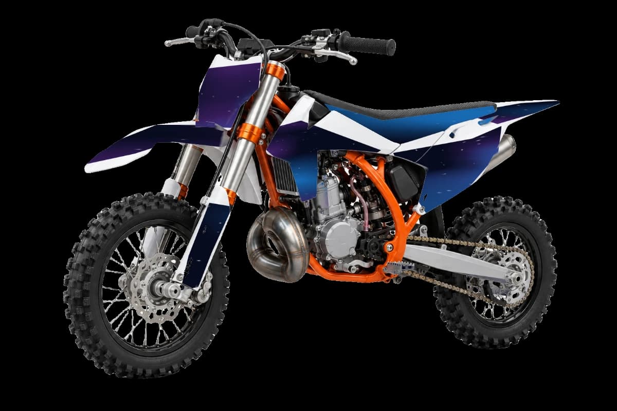 Galaxy style dirt bike graphics kit on a KTM 50 SX