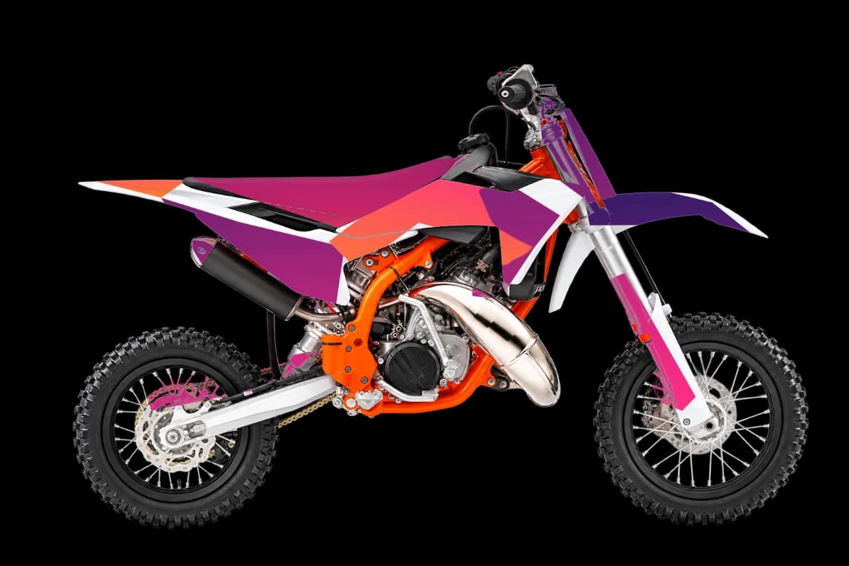 Gradient fade style dirt bike graphics kit on a KTM 50 SX