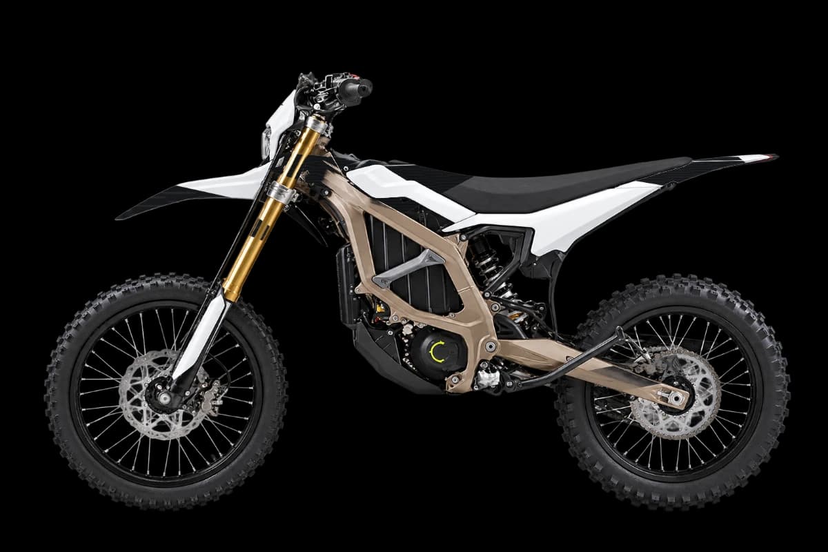 Carbon fiber style dirt bike graphics kit on a Sur-Ron Ultra Bee
