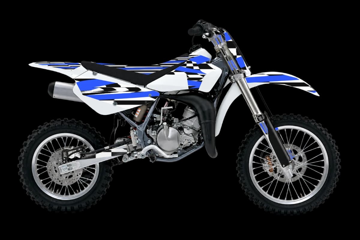 Checkered style dirt bike graphics kit on a Suzuki RM85