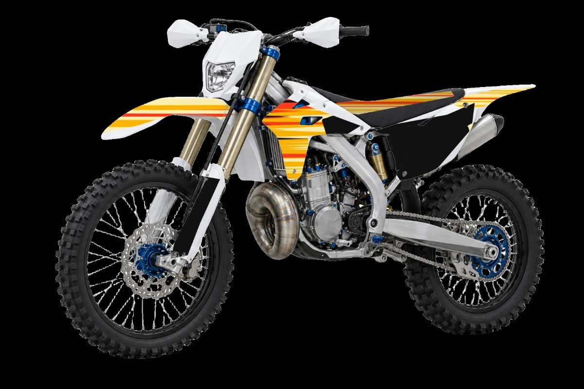 Flame style dirt bike graphics kit on a TM Moto EN 125 2T