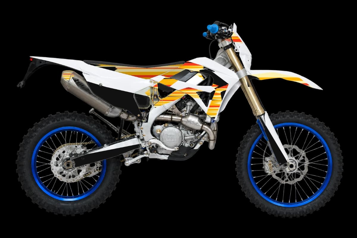 Flame style dirt bike graphics kit on a TM Moto EN 300 4T
