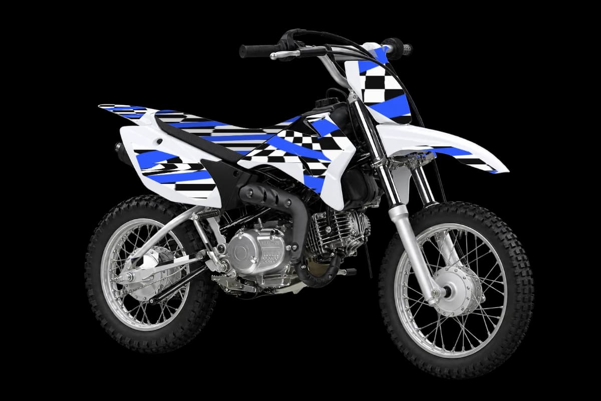 Checkered style dirt bike graphics kit on a Yamaha TT-R110E