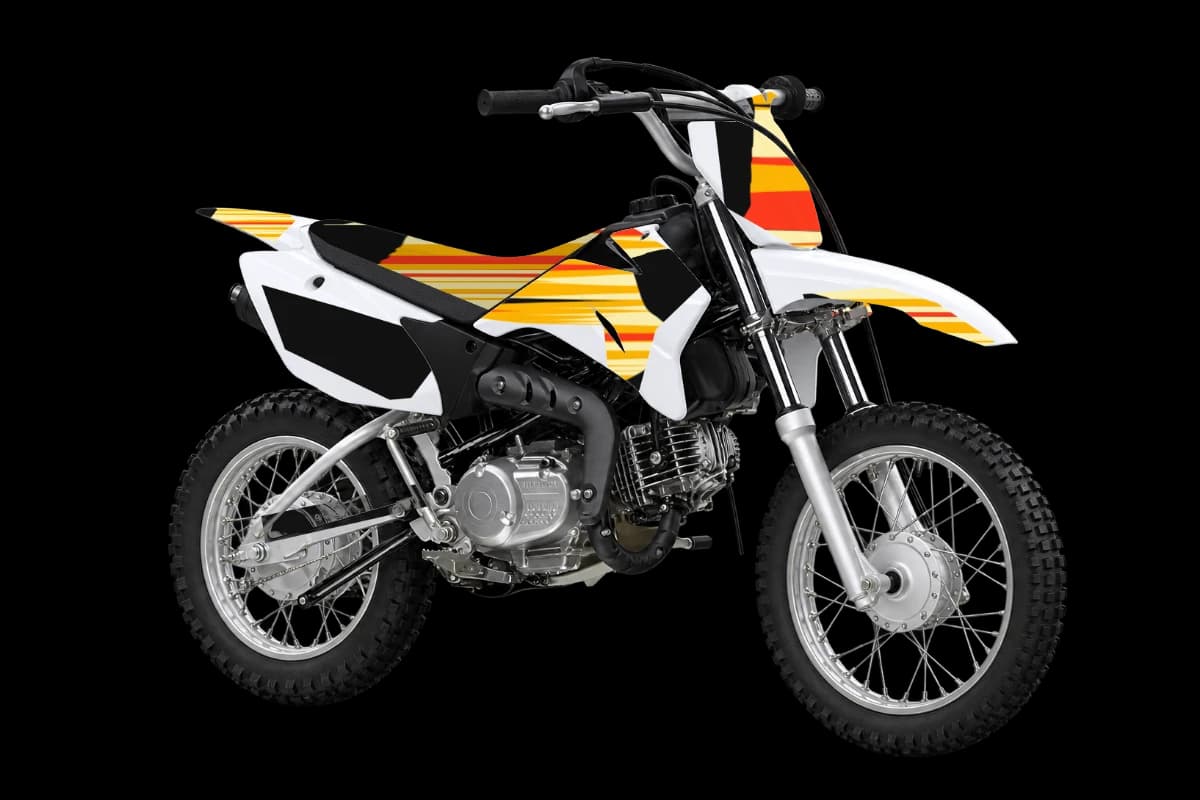 Flame style dirt bike graphics kit on a Yamaha TT-R110E
