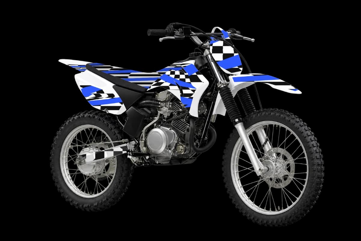 Checkered style dirt bike graphics kit on a Yamaha TT-R125LE