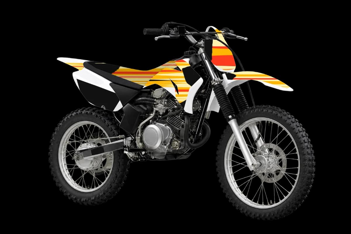 Flame style dirt bike graphics kit on a Yamaha TT-R125LE