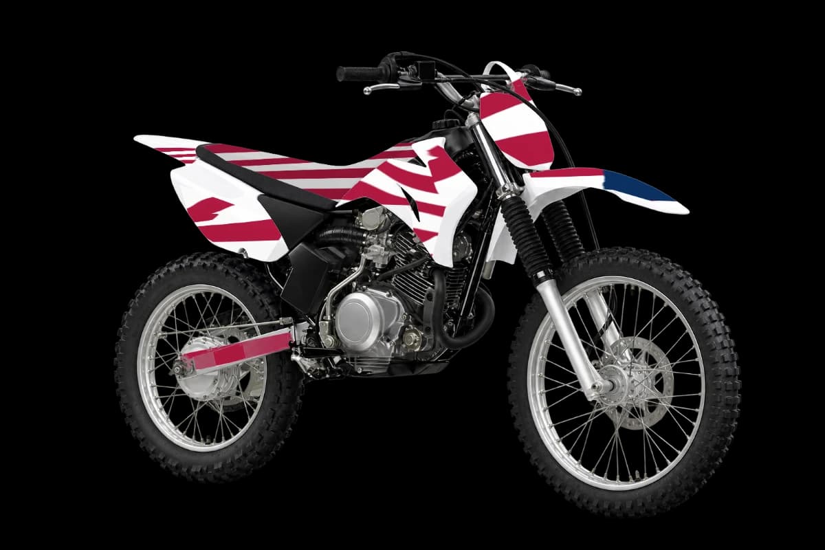 American flag style dirt bike graphics kit on a Yamaha TT-R125LE