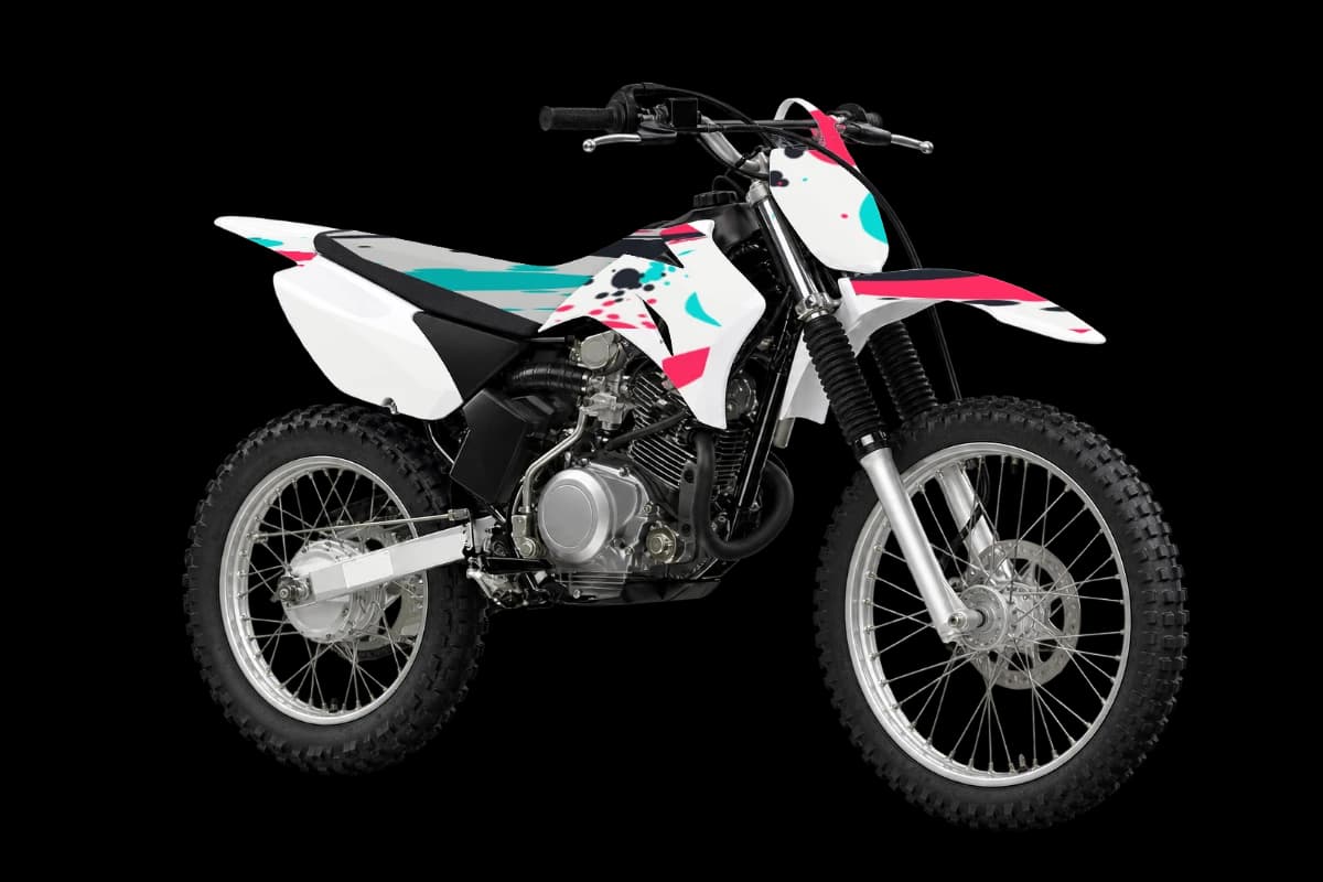 Paint splatter style dirt bike graphics kit on a Yamaha TT-R125LE