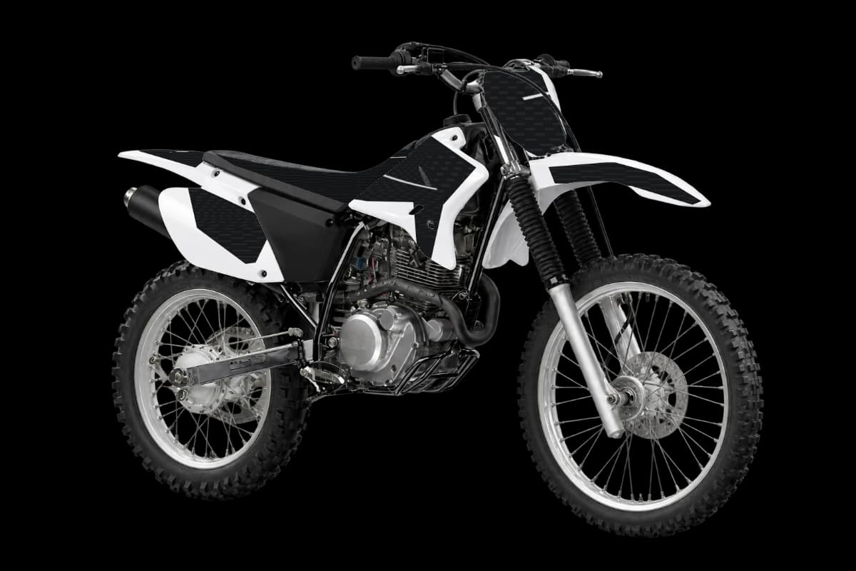 Carbon fiber style dirt bike graphics kit on a Yamaha TT-R230