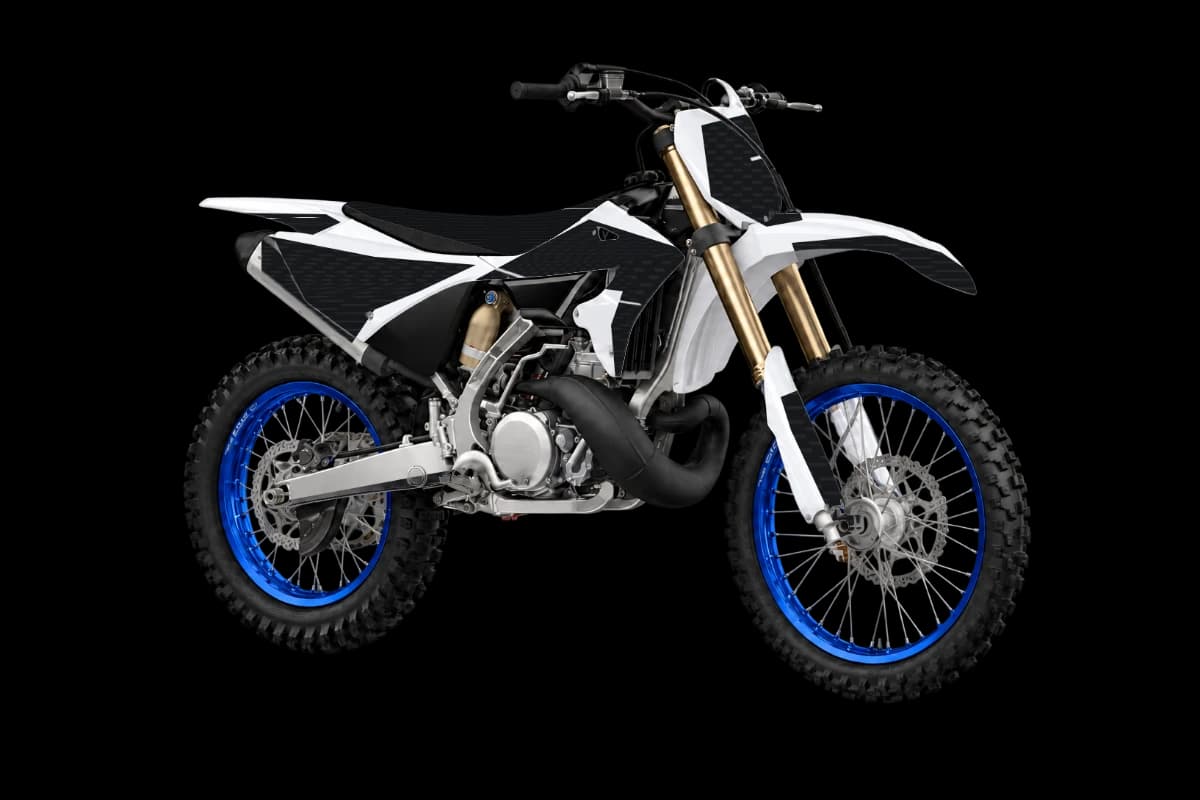 Carbon fiber style dirt bike graphics kit on a Yamaha YZ250X