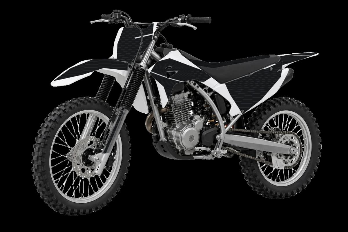 Carbon fiber style dirt bike graphics kit on a Honda CRF300F
