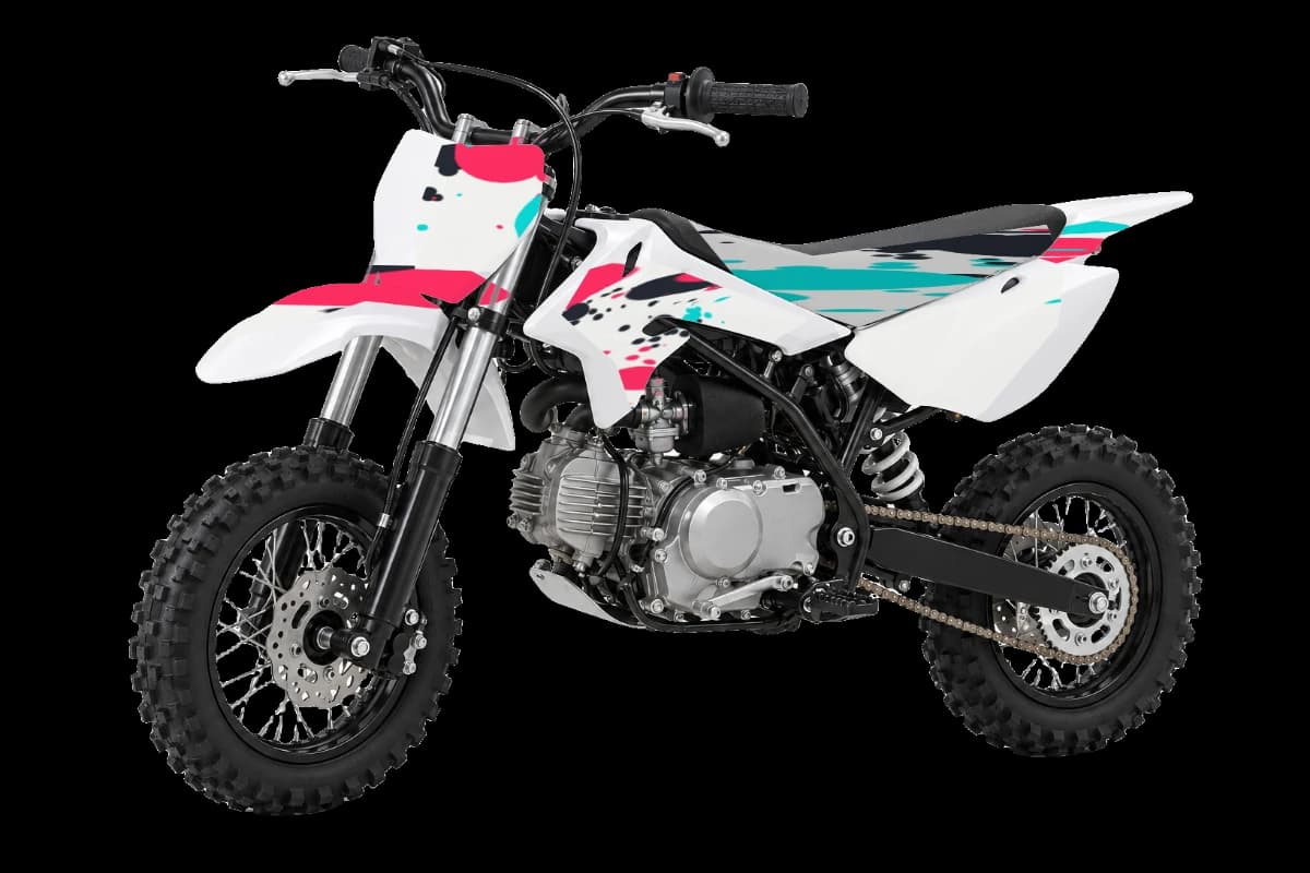 Paint splatter style dirt bike graphics kit on a Kayo KMB