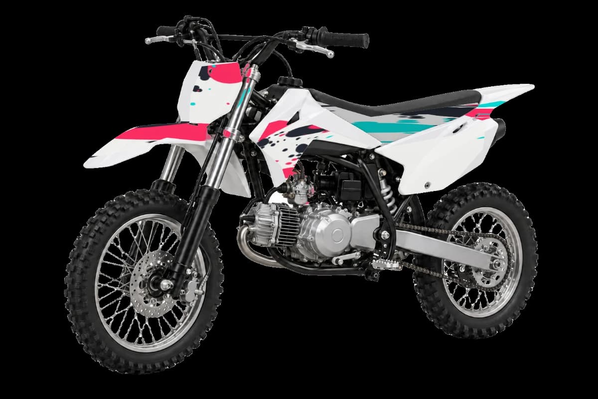Paint splatter style dirt bike graphics kit on a Kayo TS90