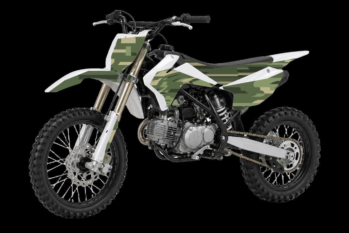 Digital camo style dirt bike graphics kit on a Kayo TT140