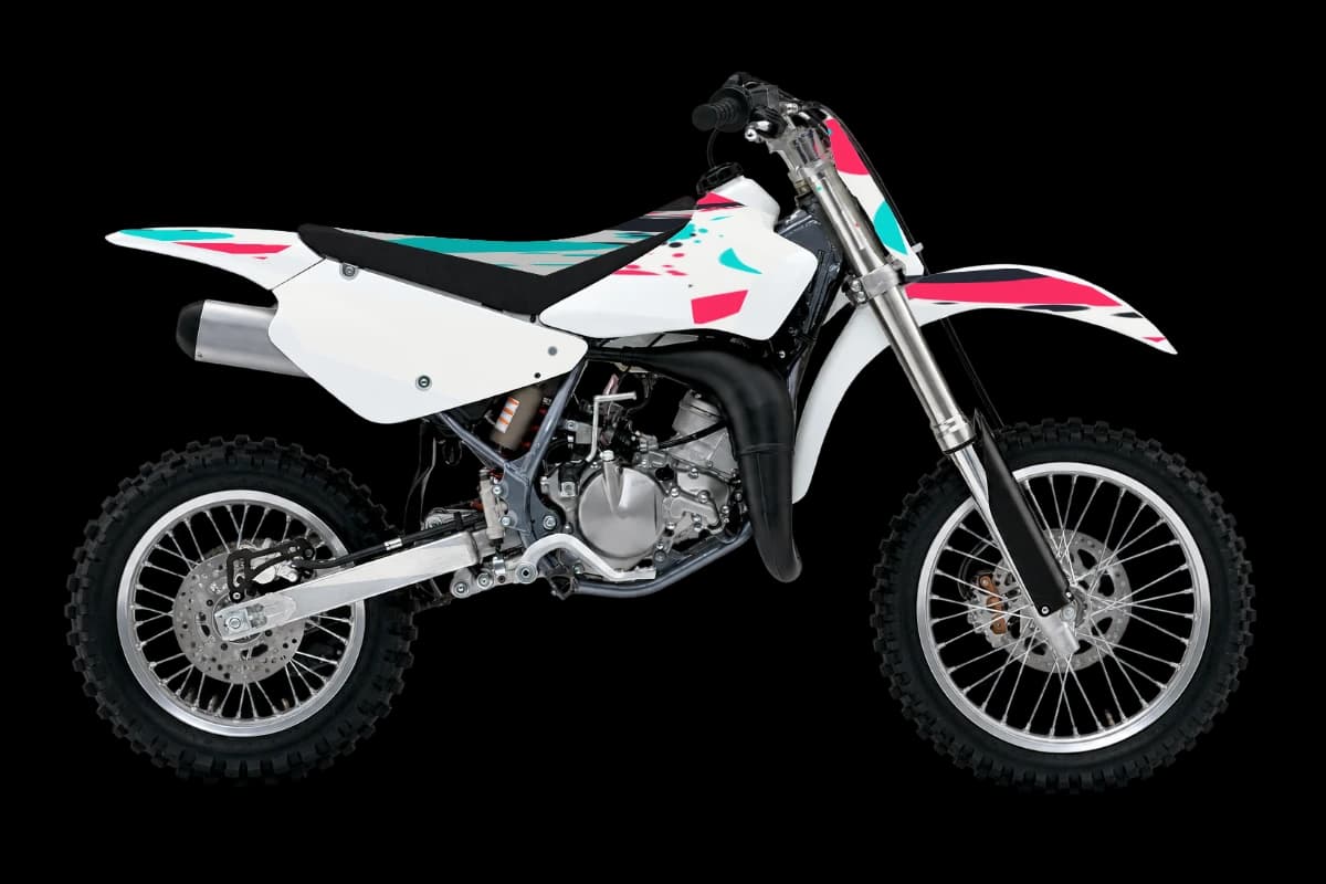 Paint splatter style dirt bike graphics kit on a Suzuki RM85