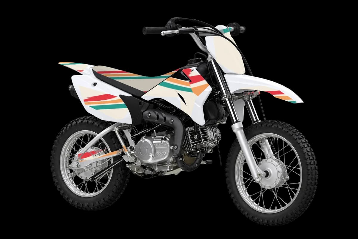 Retro style dirt bike graphics kit on a Yamaha TT-R110E