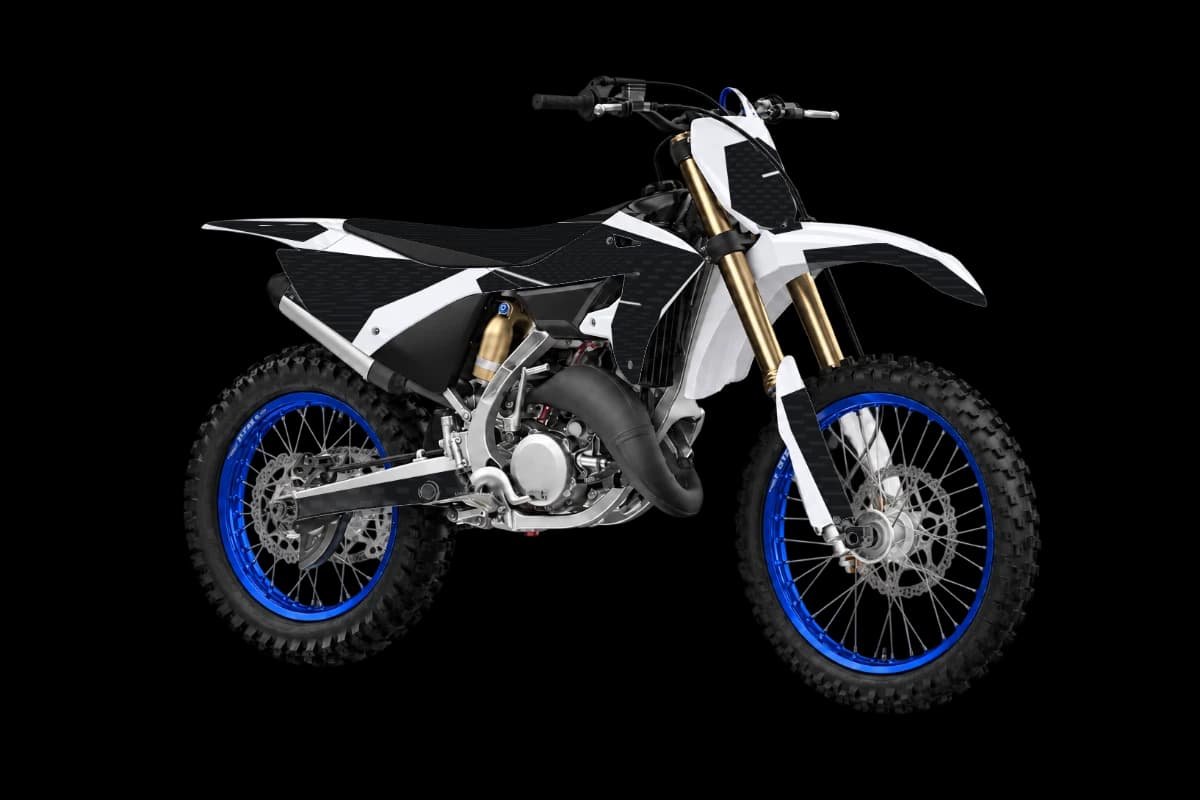 Carbon fiber style dirt bike graphics kit on a Yamaha YZ125X